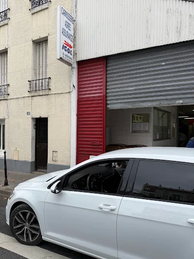 Façade du garage, rue Lambrechts